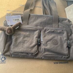 Kipling Tan Duffel Bag with Dual Pockets